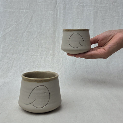 Compact Ceramic Tumbler with Playful Curved Form