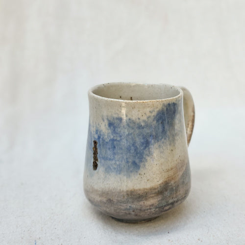 Simple Ceramic Mug with Soft Sculpted Form