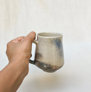 Compact Ceramic Mug with Gentle Curved Profile