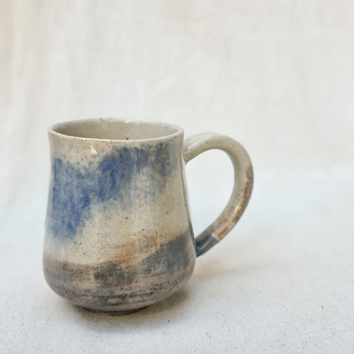 Compact Ceramic Mug with Gentle Curved Profile